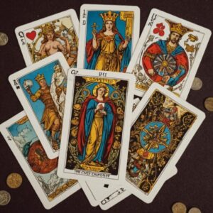 Combinação das cartas O Louco e O Mundo sobre decisões difíceis